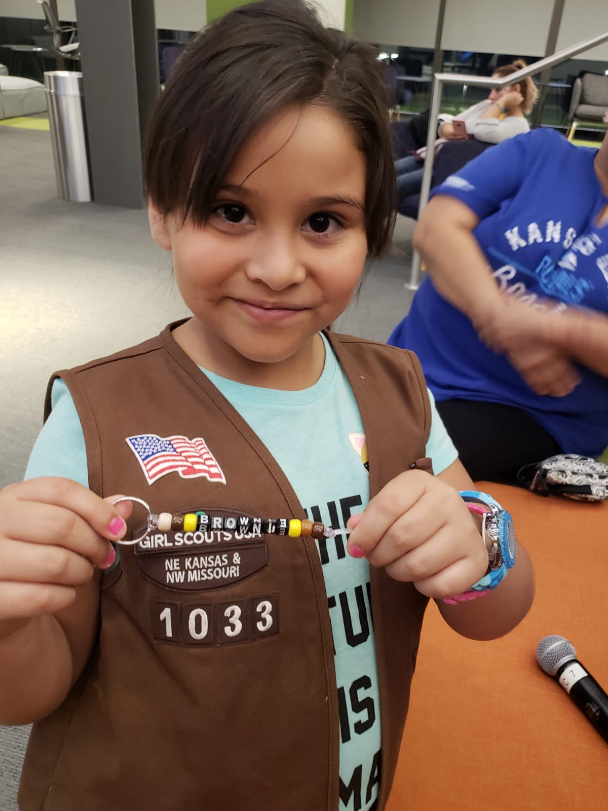 One scout displays her finished IP packet keychain!